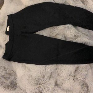 Black legging with back zipper and zippers at ankles